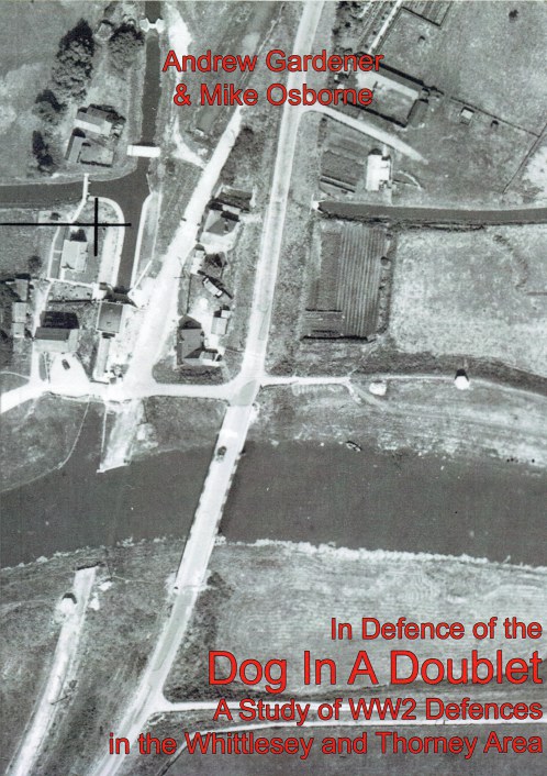Image for IN DEFENCE OF THE DOG IN A DOUBLET : A STUDY OF WW2 DEFENCES IN THE WHITTLESEY AND THORNEY AREA (SIGNED COPY)